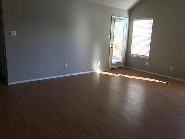 Living Room with back door to patio