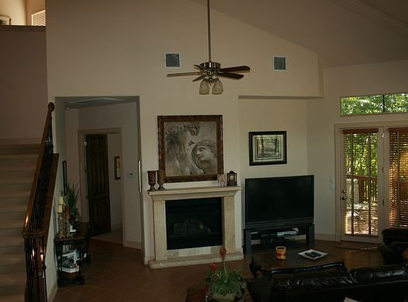 Downstairs Living: Cathedral Ceilings, Stone Fireplace and an Abundance of Nat