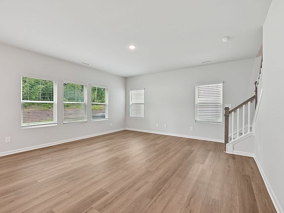 Great room in the Brentwood floorplan at a Meritage Homes community in Garner, NC.