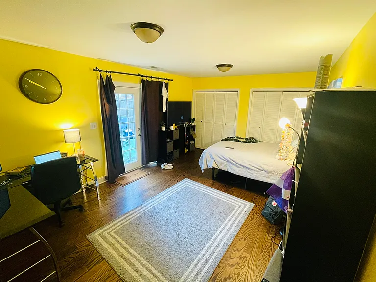 Basement suite connects to private back porch/patio. Perfect for an office/gym. Can open the doors and connect to the patio to make the space feel much bigger!