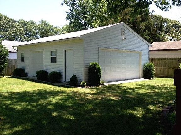 MONSTER 2 1/2 garage in back. Exercise room, workshop, man