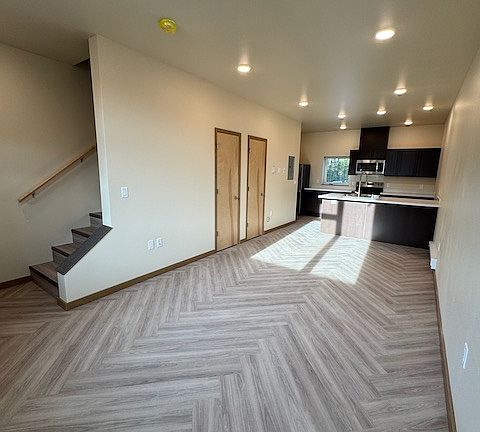 Interior of Unit, looking from front toward kitchen