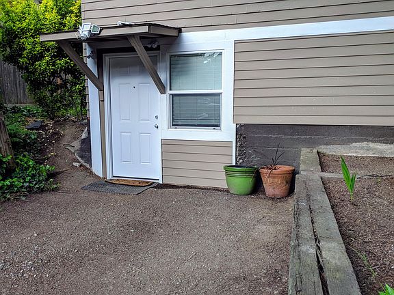 Driveway and private entrance to apartment