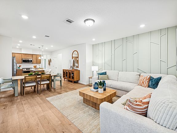 The Mockingbird II- Family Room into Dining and Kitchen