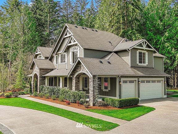 Covered front porch, east facing front and west facing backyard.
