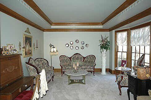 Formal Living Room With Bay Window & Trey Ceiling
