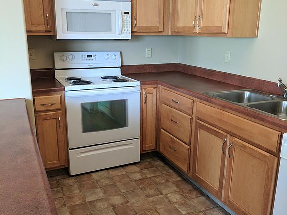 Large kitchen with lots of counter space and breakfast bar!