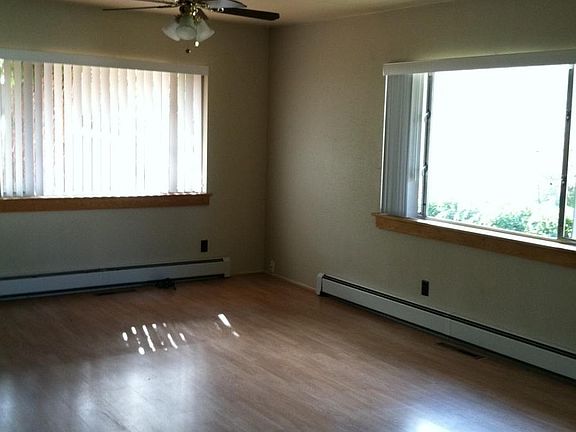 Large den (or playroom, dining room, office) in back