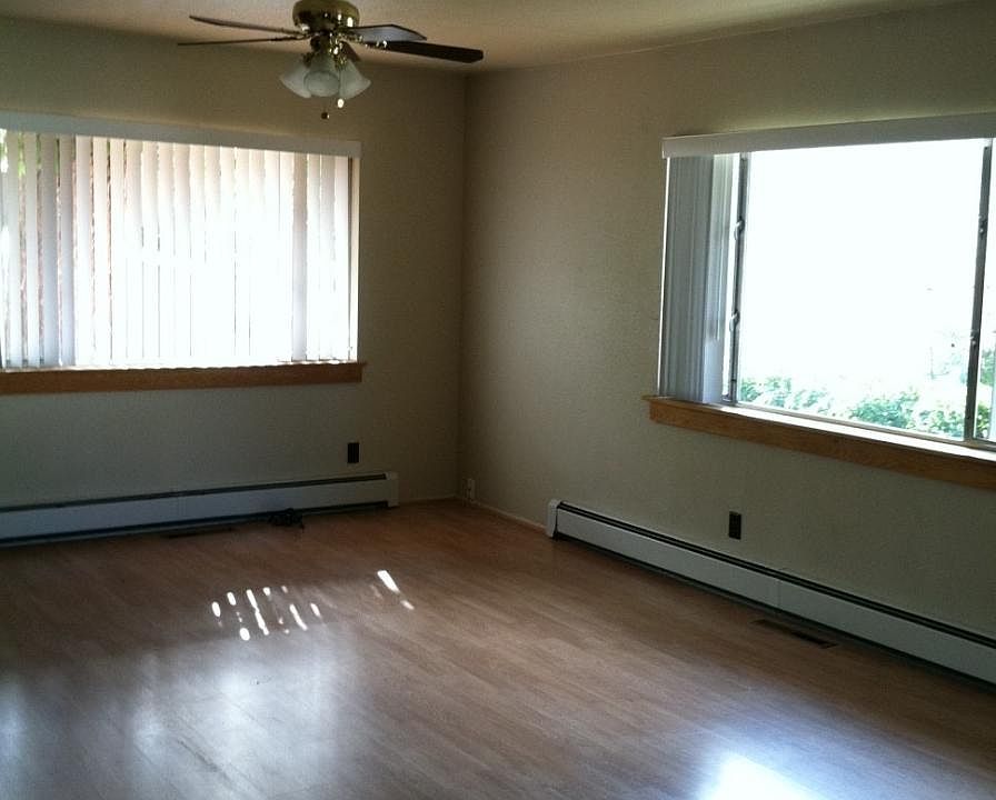 Large den (or playroom, dining room, office) in back