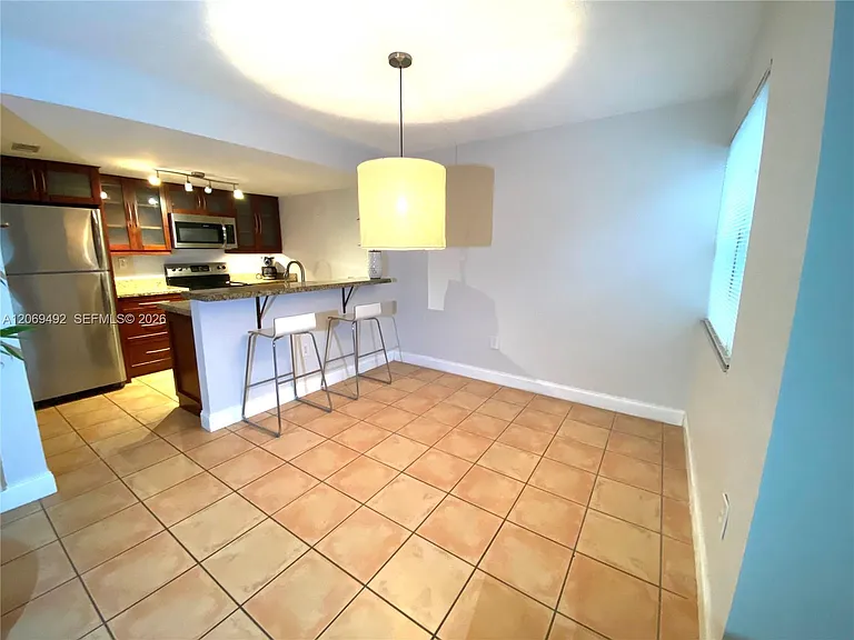 4530 SW 68th Court Cir #6-32 — Photo 1