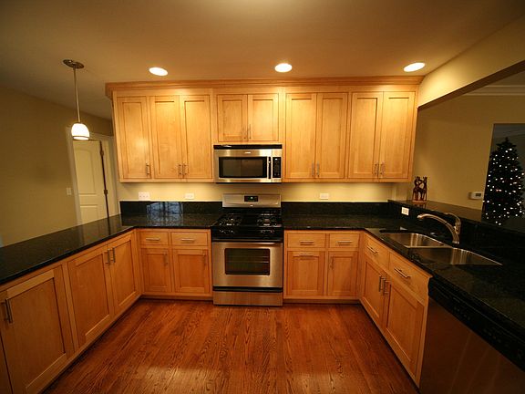 Custom built maple cabinet with granite