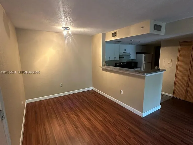 5035 Wiles Rd #203 — Photo 2