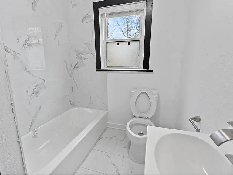 5408 Woodland Ave — Photo 23