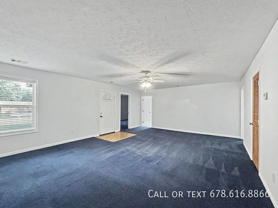 3BR/1BA Triplex Home in Loganville Bonus Room, Separate Driveway & Storage Shed — Photo 3