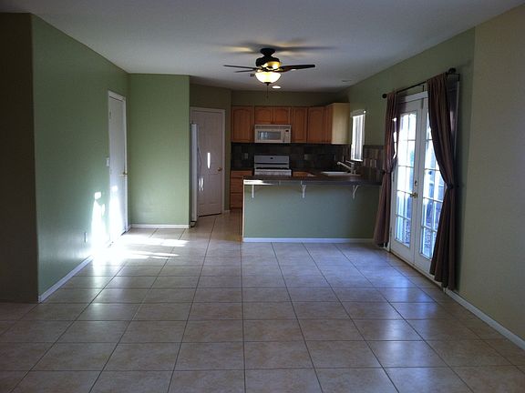 Dining and kitchen area with breakfast bar