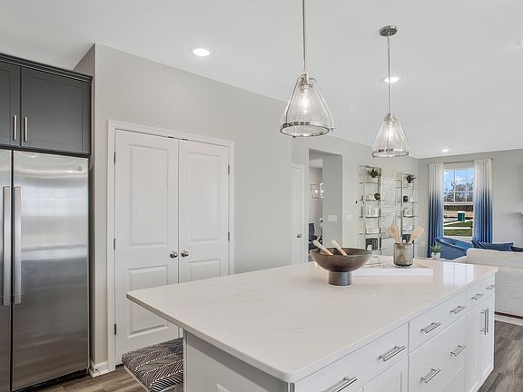 Kitchen adjacent to great room