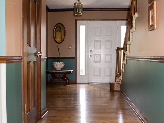 Front entry way, door and staircase