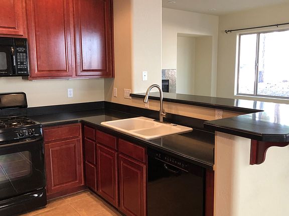 Kitchen is open to living room.