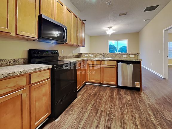 3rd image of 7093 Rapid River Dr W