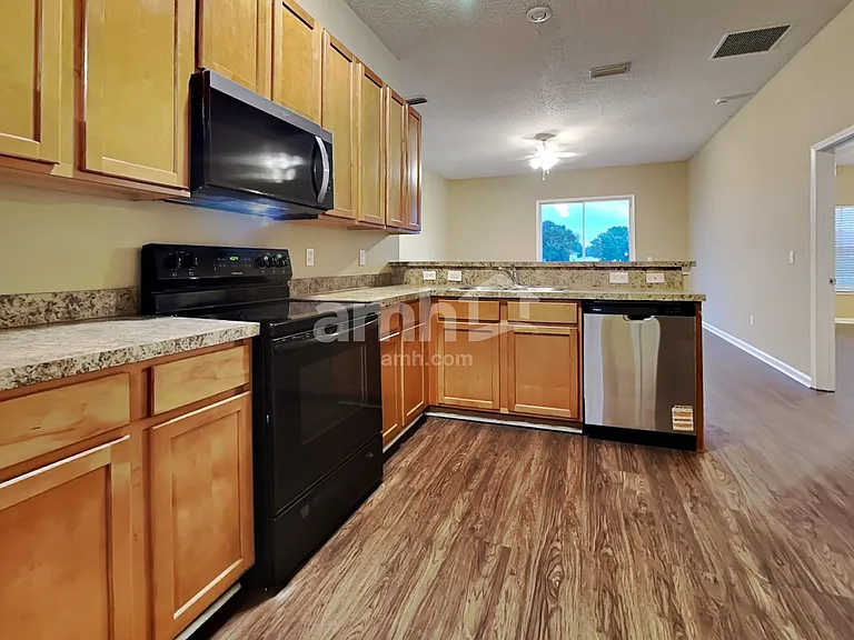 7093 Rapid River Dr W — Photo 3
