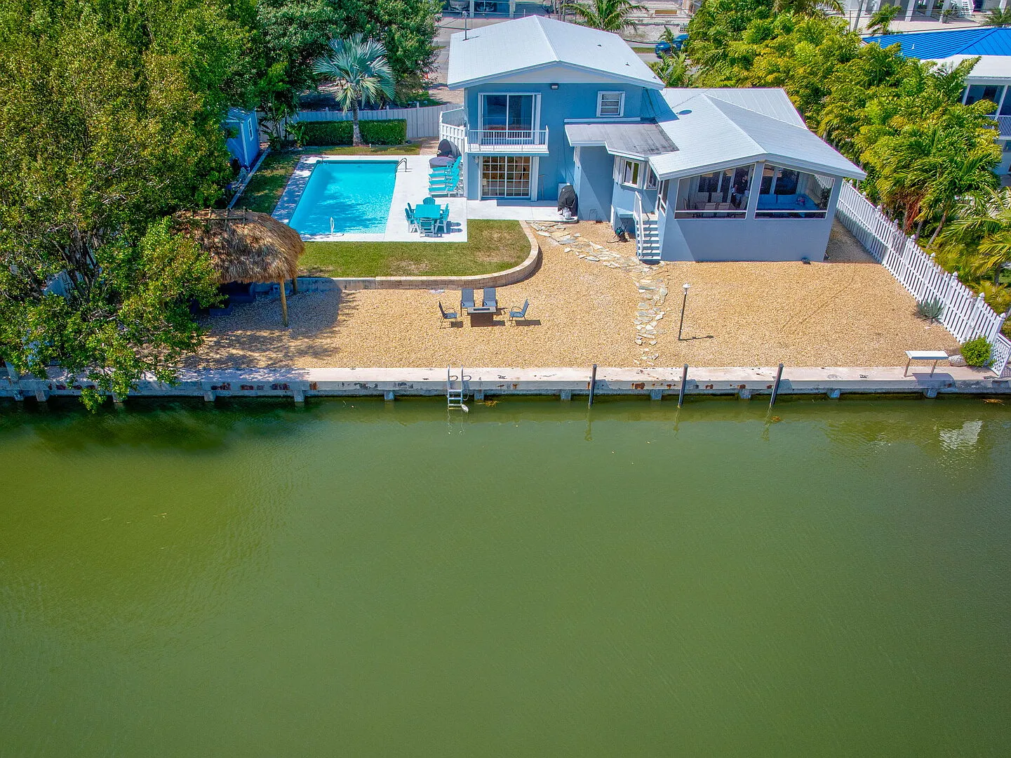 Easy Breezy Family Complex 5BR 3BTH 100ft Dock, Pool, & Beach! — Photo 3