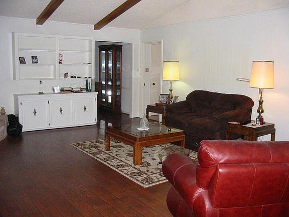 Beautiful hardwoods in this huge living room with wet bar.