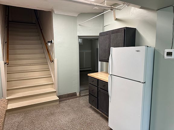 Added cupboards by the fridge