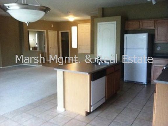 4th image of 9533 E Keats Ave