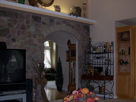 Great Room Featuring Beautiful Stone Wall