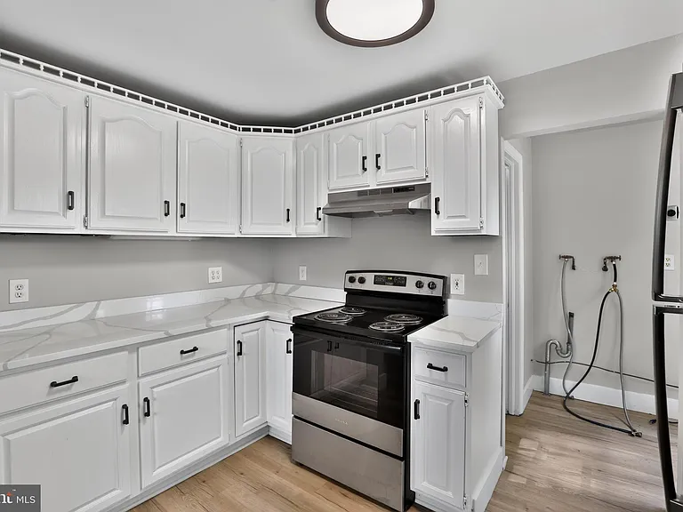 1539 Reservoir Ave — Photo 7