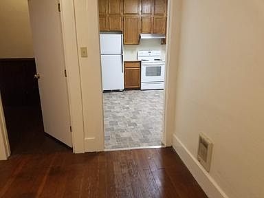 Den to left Kitchen on right