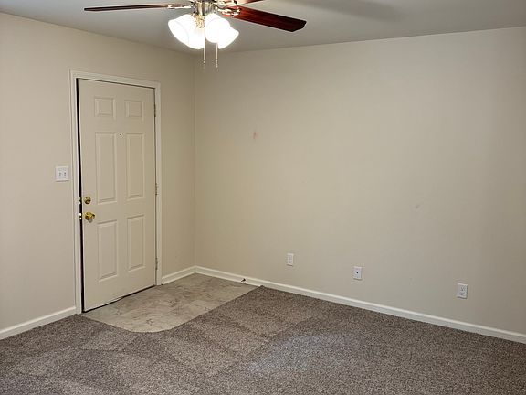 Living room with satin nickel ceiling fan