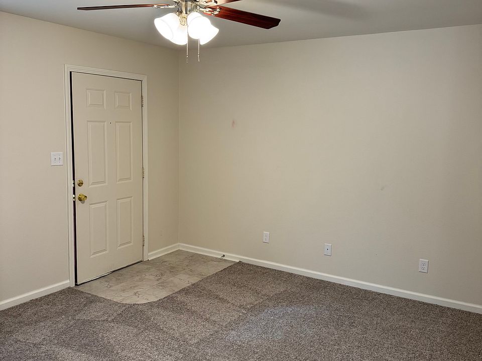 Living room with satin nickel ceiling fan