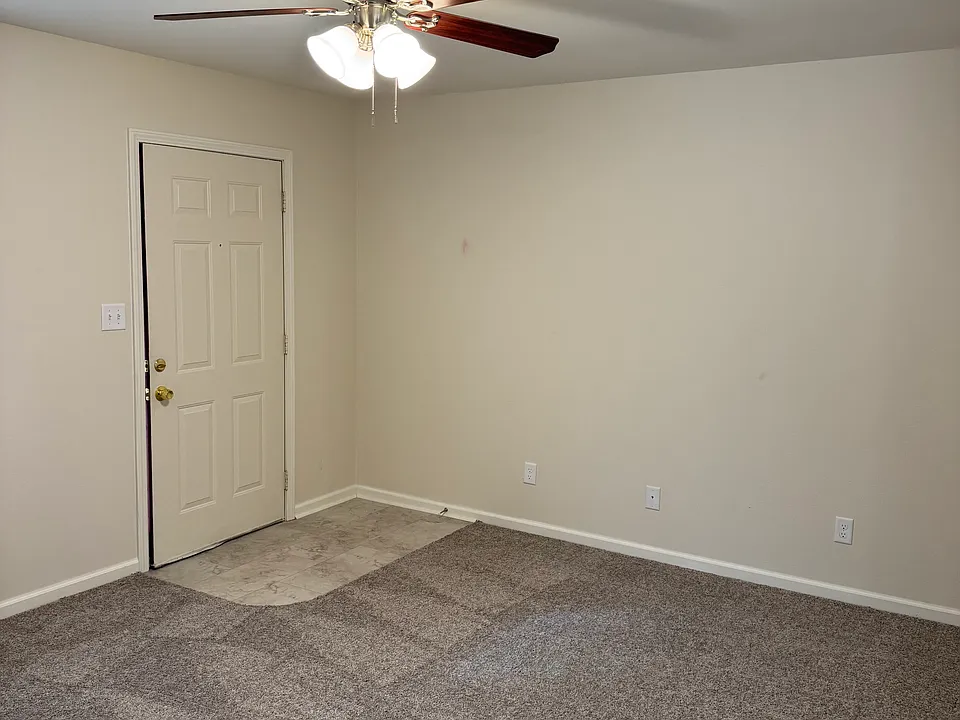 Living room with satin nickel ceiling fan