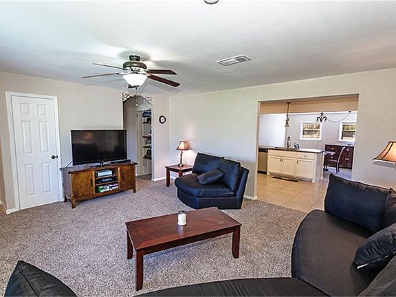Living Room looking into Kitchen & Dining Room
