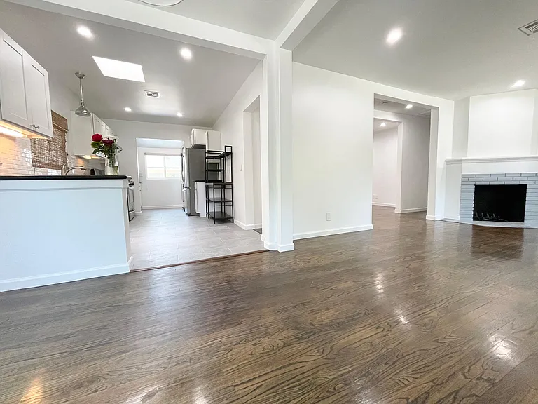 Living room - front door is to the right and kitchen to the left