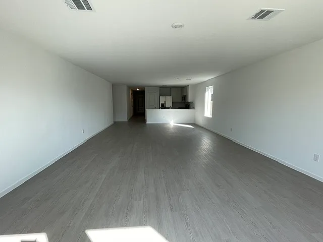 View from the back of the house showing the living & dining area.