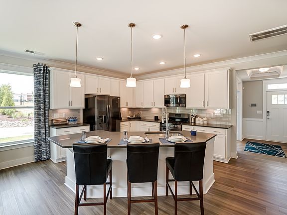 These photos are representative of this floor plan, but all options may not be available in every co