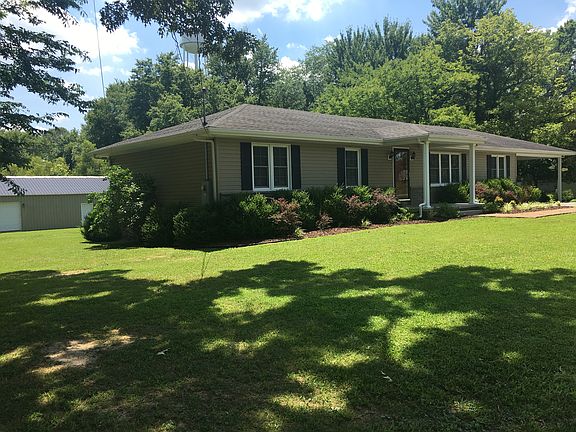 1 acre w/ big garage in back