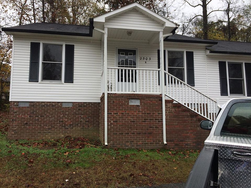 Front view of tri-plex apartment building