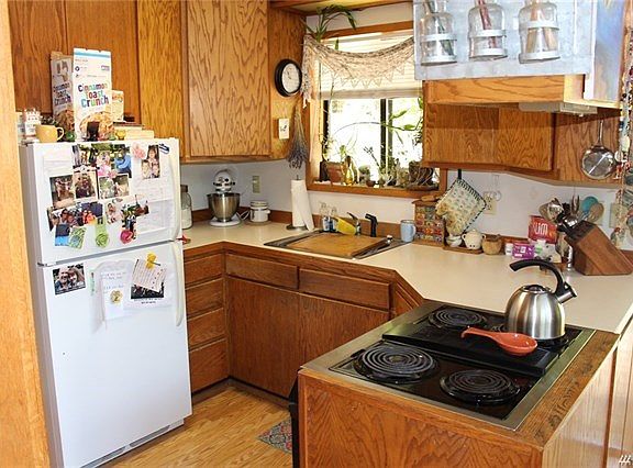 Kitchen with laminate floors.