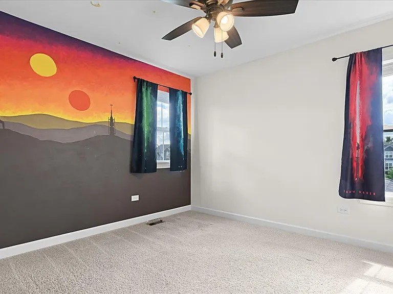Fourth bedroom, currently painted with Star Wars mural but can be painted neutral color at no cost to new tenant.
