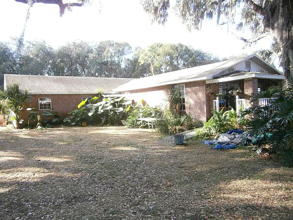 Call 813 996 7770 to pre-qualify. Room to roam in this large country home on 2 acres.