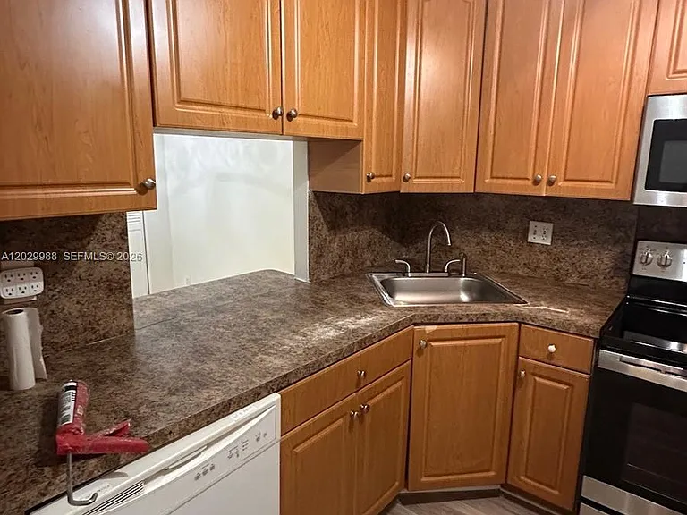 5950 NW 25th Pl #233 — Photo 11