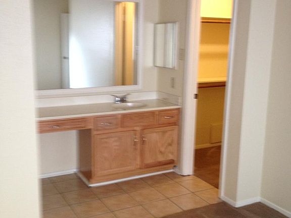Master bedroom, vanity and walk in closet