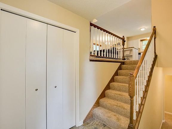 As you walk in the home you welcomed with a large entry way.  The coat closet is convenient storage.