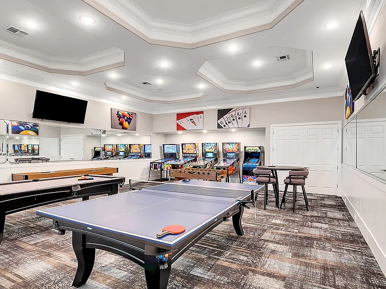 Community game room with ping-pong, billiards, video games, and more