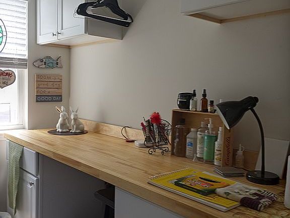 Laundry room added cabinets.