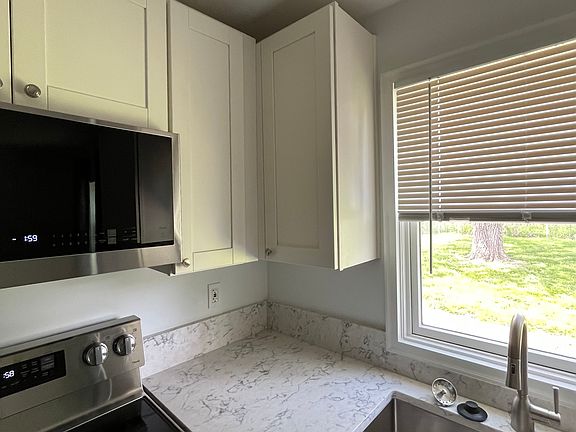 New kitchen sink, countertops, cabinets and appliances.