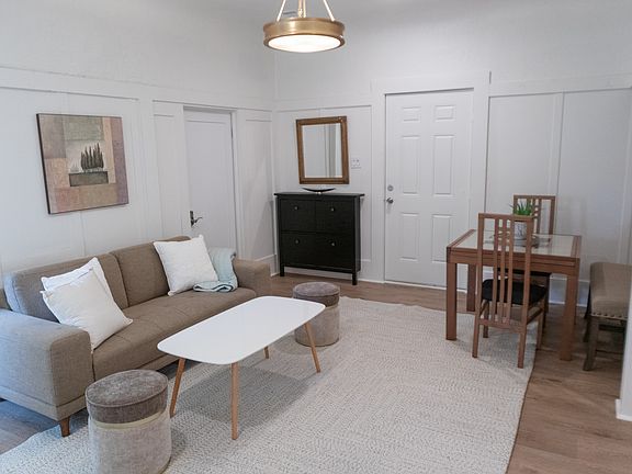 Main entry door, 3-tier shoe storage, and quality sofa